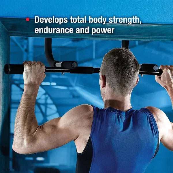 Rear view of man performing wide-grip pull-up on doorway bar showing back muscle engagement and proper form