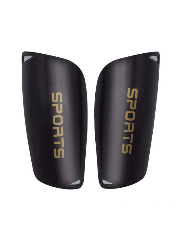 Pair of black soccer shin guards with gold SPORTS branding