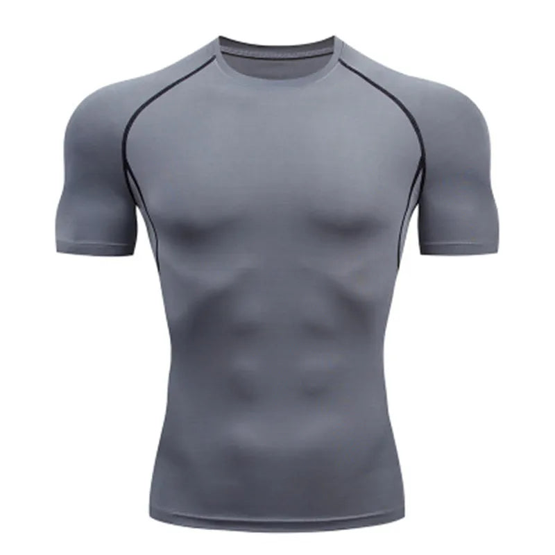 Men's gray short sleeve compression shirt with flatlock seams and moisture-wicking fabric for athletic training and gym workouts